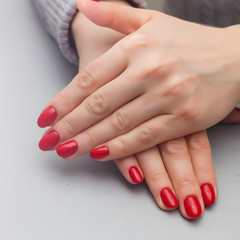 Hands of a woman before and after manicure and skin treatment