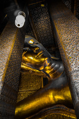 Wat Pho ( Temple of the Reclining Buddha), or Wat Phra Chetuphon, is located behind the Temple of...