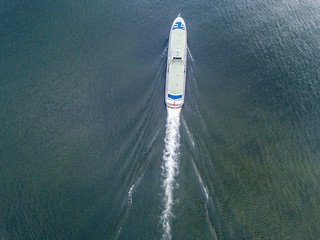 Aerial view of passenger ferry ship cruising on a lake in Switzerland.