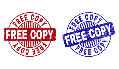 Grunge FREE COPY round stamp seals isolated on a white background. Round seals with grunge texture in red and blue colors. Vector rubber imprint of FREE COPY text inside circle form with stripes.