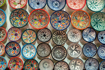 Colorful dish souvenirs for sale in a shop in Morocco