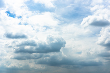 The vast blue sky with soft white clouds. Abstract white and blue background.