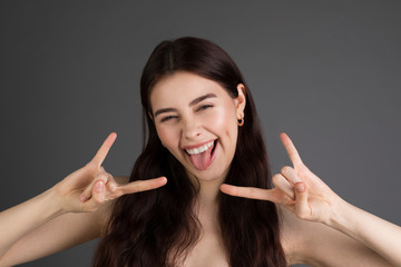 Obraz premium Close up portrait of positive happy european brunette woman