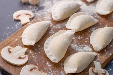frozen dumplings on a cutting board