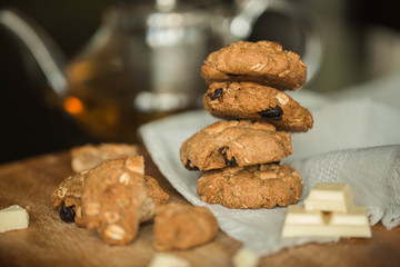 oatmeal cookies with chocolate and tea