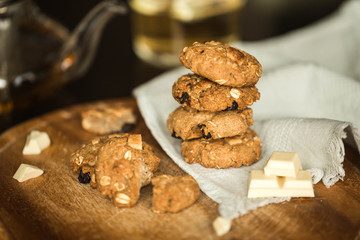 oatmeal cookies with chocolate and tea