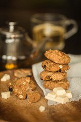 oatmeal cookies with chocolate and tea