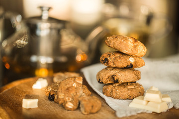 oatmeal cookies with chocolate and tea