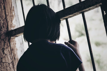 Fototapeta premium Young girls were detained and tortured in the concept of women in the trafficking of people, the concept of human trafficking.