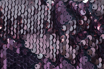 brown sequin background with blinking lights