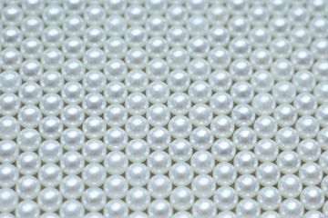 pile of pearls on the white background 