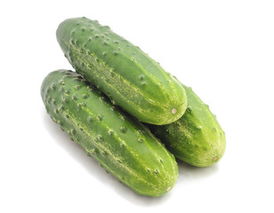 Three ripe cucumbers.