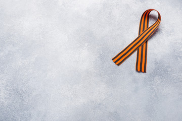 George ribbon on a concrete background. Symbol may 9, victory day. Copy space
