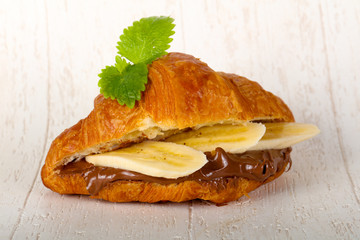 Croissant with chocolate and banana