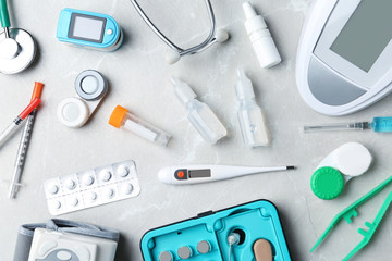 Flat lay composition with medical objects on grey background