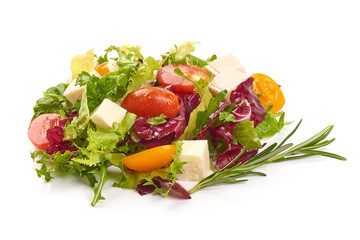 Mixed salad leaves frisee, radicchio and lamb's lettuce, close-up, isolated on white background
