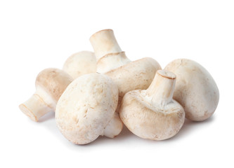 Fresh champignon mushrooms isolated on white. Healthy food