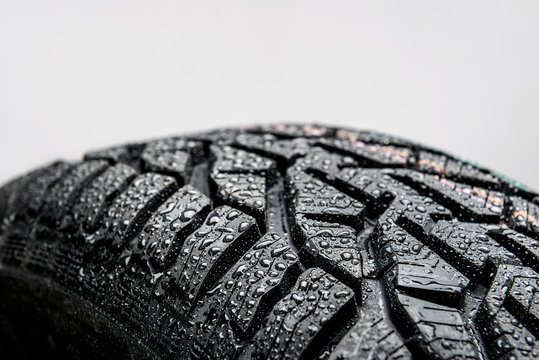 Close Up Of Car Tire  With Water Droplets