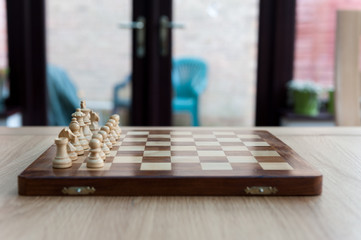 Fototapeta na wymiar chess board moves on wooden set board