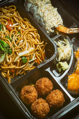 Traditional Set Of Asian Food On A Plastic Service Plate