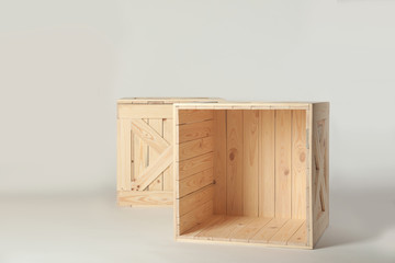 Wooden crates on light background, space for text. Shipping containers