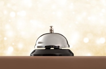 Vintage hotel reception service desk bell.