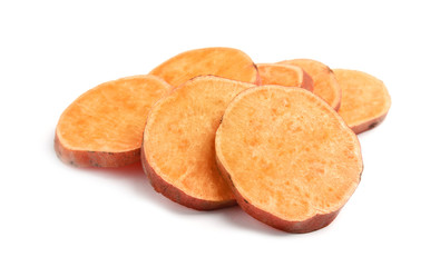 Slices of ripe sweet potato on white background