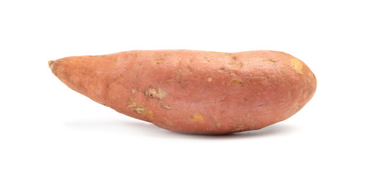 Whole ripe sweet potato on white background