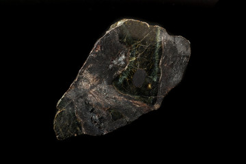 Macro Diopside mineral stone on black background