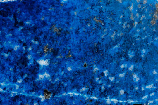 Macro of mineral stone Lazurite on a black background