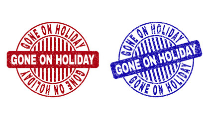 Grunge GONE ON HOLIDAY round stamp seals isolated on a white background. Round seals with grunge texture in red and blue colors.