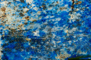 Macro of mineral stone Lazurite on a black background
