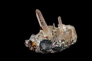 Macro stone mineral Quartz crystals on a black background