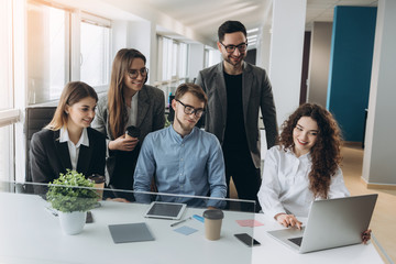 Full concentration at work. Corporate team working colleagues working in modern office