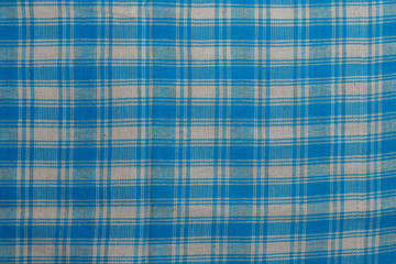 Loincloth natural cotton textile with white and blue square grid pattern.