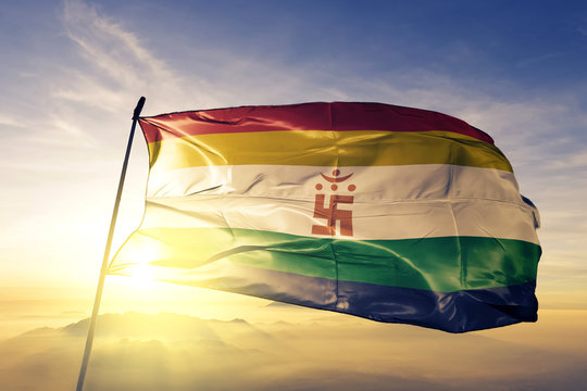 Jainism flag waving on the top sunrise mist fog