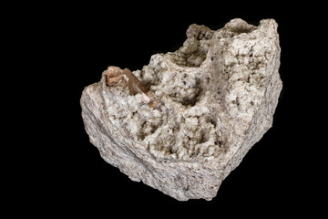 Macro stone Topaz mineral in rock on a black background