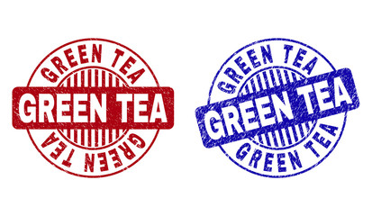 Grunge GREEN TEA round stamp seals isolated on a white background. Round seals with grunge texture in red and blue colors. Vector rubber watermark of GREEN TEA text inside circle form with stripes.