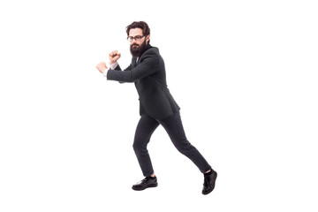 Obraz premium Full length portrait of a bearded businessman pulls an invisible rope, isolated on white background