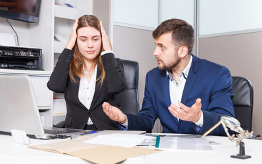 Frustrated female and male sales managers