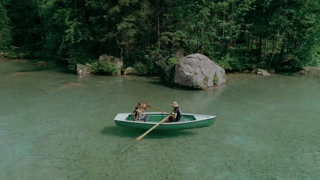 Slow motion beautiful shot of adventure seeking nomad couple during summer road trip to mountains or national park. Epic and inspiring travel destination for 2020, explore more and get outside concept
