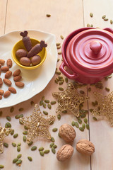 easter chocolate with some nuts and pumpkin seeds on wooden table