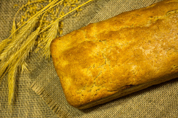 fresh bread, wheat ears and grains