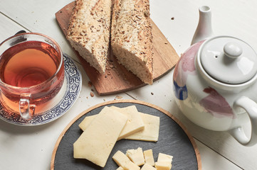 cup of tea and cookies on table
