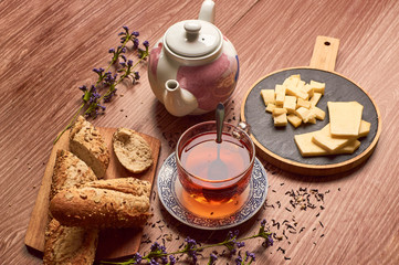 Tea with breand and cheese