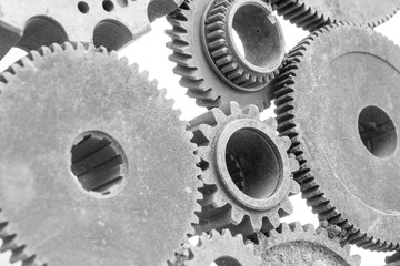 The old gear wheels are assembled into a movement mechanism, the details of the puzzle. Industry, Concept business ideas, strategies, creativity, cooperation, teamwork