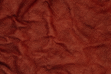 Natural dark leather abstract background detailed closeup. 