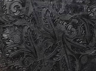 Geprägtes glänzendes schwarzes Leder mit Blumenmotiv © alexlibris