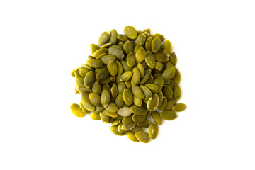Pumpkin seeds on a white background, isolated. Healthy vegetarian snack.