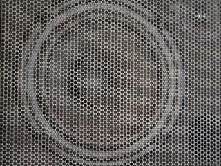 close-up speaker with grill.